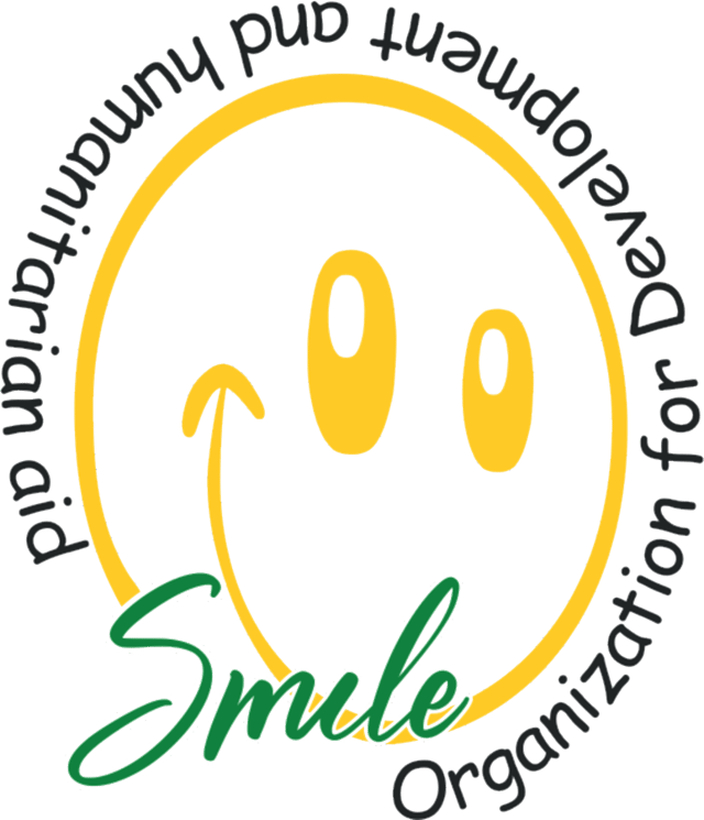 The Smile Organization logo, a yellow smiley face above the word Smile in green script